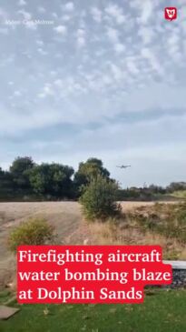 Firefighting aircraft water bombing bushfire