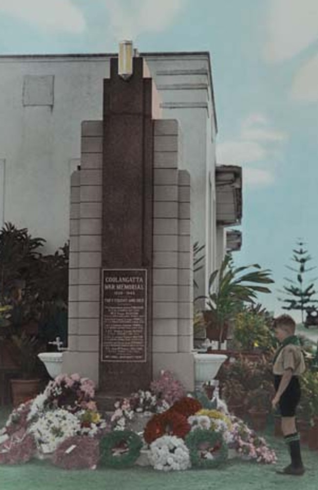 A Boy scout pays his respects at the Second World War memorial, Coolangatta, Queensland, 1946. Picture: Gold Coast Local Studies Library.