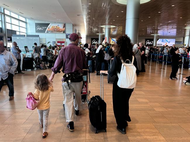 Australians arriving at Ben Gurion Airport Tel Aviv, to board a Qantas mercy flight to London. Picture: Jordan Polevoy