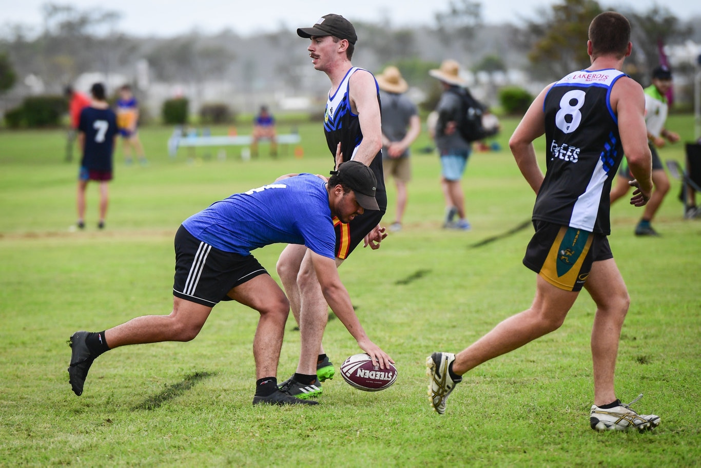 6Packs Joshua Maroney puts the ball on the ground.