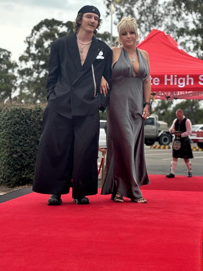 Students from Urangan State High School arrive at their formal.