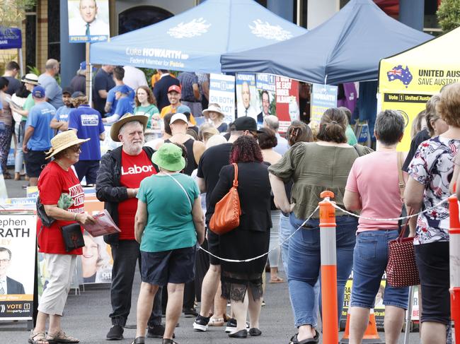 Crowds waiting to line up for early voting at Chermside Kedron Community Church in the Brisbane seat of Lilley. Picture Lachie Millard