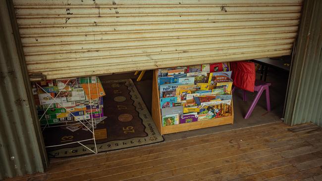 A jammed roller door on the school room at Gamardi means there's no breeze. Picture: Rebecca Parker