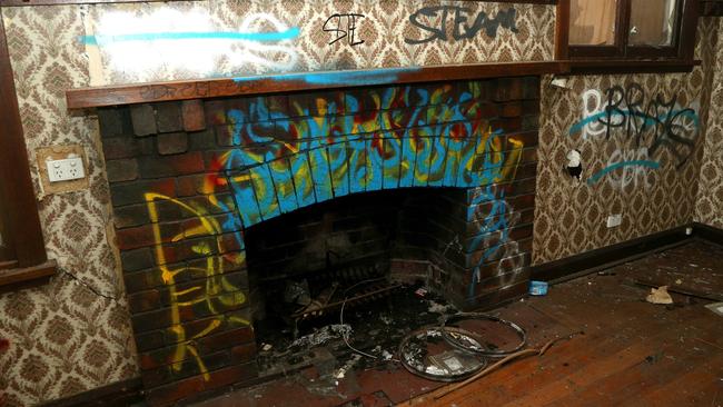 Burnt-out items in the property’s fireplace.