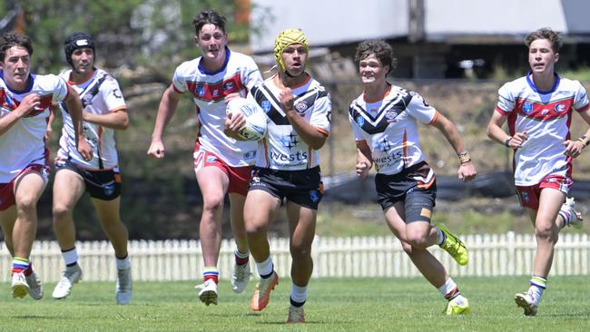 Ashton Dewanto got the Tigers on the board on the stroke of halftime. Picture: Martin Ollman