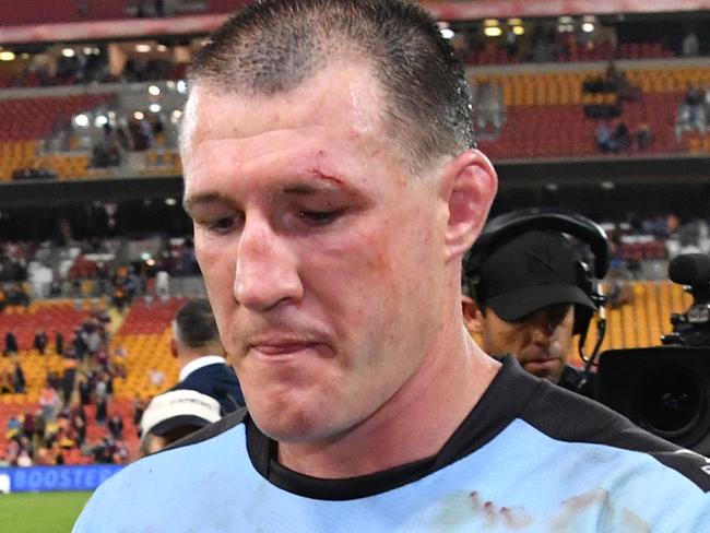 Paul Gallen of the Sharks leaves the field after losing in his 300th NRL game in the round 23 NRL match between the Brisbane Broncos and the Cronulla Sharks played at Suncorp Stadium in Brisbane, Friday, August 11, 2017. (AAP Image/Darren England) NO ARCHIVING, EDITORIAL USE ONLY