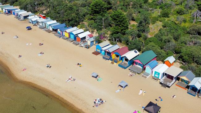 ESCAPE. Mornington Neighbourhood.  The bathing or beach boxes at Mills beach in Mornington, on the beautiful Mornington peninsula coast. Photo - istock