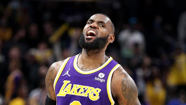 LeBron James just can’t stay on the court. Photo by Andy Lyons/Getty Images