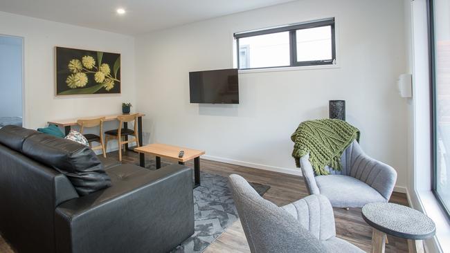 The cosy interior which has a timber deck and a view of nature. Picture: Greg Power