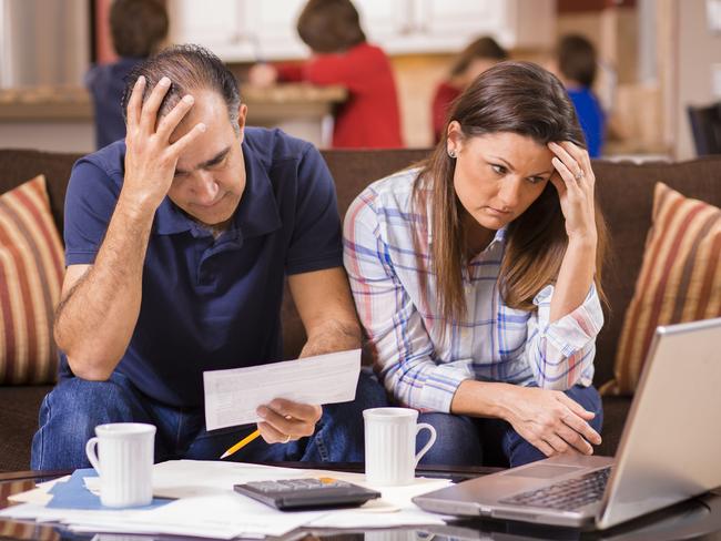 Struggling to pay bills, not being able to put food on the table and asking others for money suggests you may be under financial stress. Picture: iStock