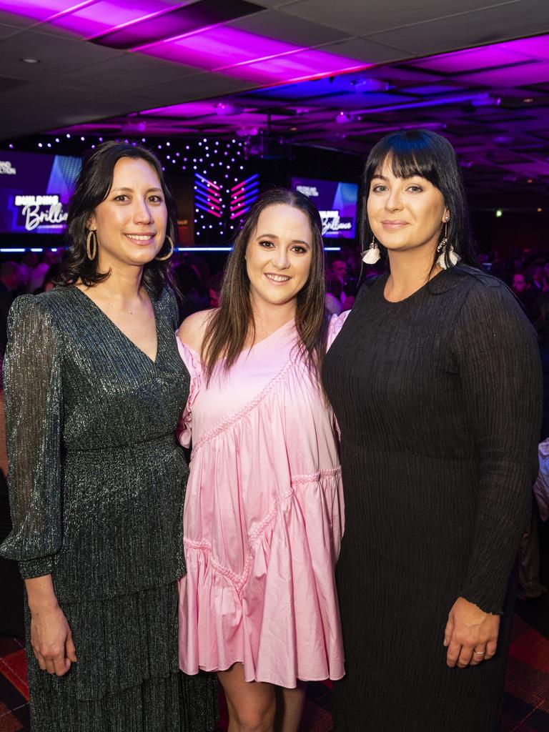 At the Downs and Western Housing and Construction Awards are (from left) Ishbel Macauley, Tarla Judd and Megan McGuinness of Hutchinson Builders at Rumours International, Friday, July 22, 2022. Picture: Kevin Farmer