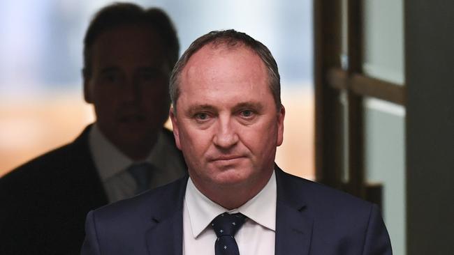 Australian Deputy Prime Minister Barnaby Joyce arrives during House of Representatives Question Time at Parliament House in Canberra, Tuesday, February 13, 2018. (AAP Image/Lukas Coch) NO ARCHIVING