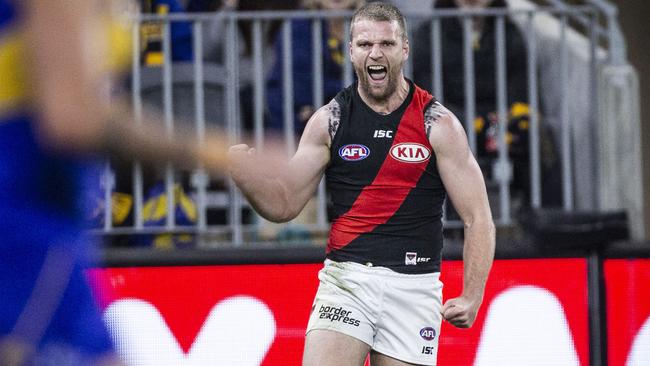 Jake Stringer celebrates a goal during Essendon’s upset win over West Coast at Perth Stadium.