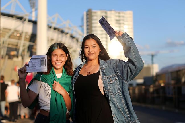 Sisters Rani and Eden Silalahi lining up for Adele’s Sunday night concert at the Gabba.