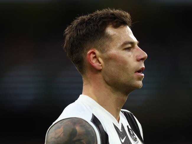 MELBOURNE, AUSTRALIA - JULY 20: Jamie Elliott of the Magpies looks on during the round 19 AFL match between Hawthorn Hawks and Collingwood Magpies at Melbourne Cricket Ground on July 20, 2024 in Melbourne, Australia. (Photo by Graham Denholm/AFL Photos/via Getty Images)