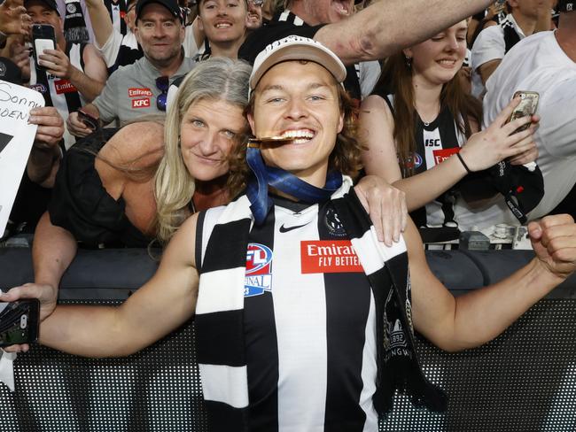 MELBOURNE, AUSTRALIA - SEPTEMBER 30: Jack Ginnivan of the Magpies poses with his Premiership Medal after the 2023 AFL Grand Final match between Collingwood Magpies and Brisbane Lions at Melbourne Cricket Ground, on September 30, 2023, in Melbourne, Australia. (Photo by Darrian Traynor/AFL Photos/via Getty Images)