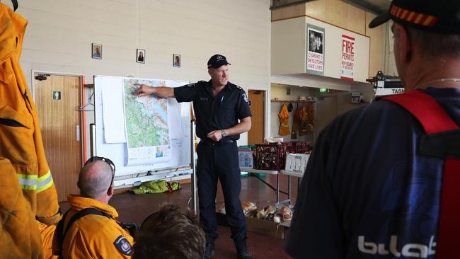 Tasmania Fire Service deputy operations officer George Auchterlonie giving a briefing at the Geeveston Fire Station before crews head out. Picture: NIKKI DAVIS-JONES