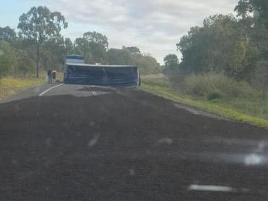 A truck rollover spread fertiliser across the highway, with the truck blocking both lanes. Picture: Jodie Marie Cranston/Facebook