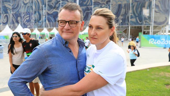 Mack Horton's parents Andrew and Cheryl Horton outside the Olympic Aquatic Centre in Rio. Picture: Alex Coppel