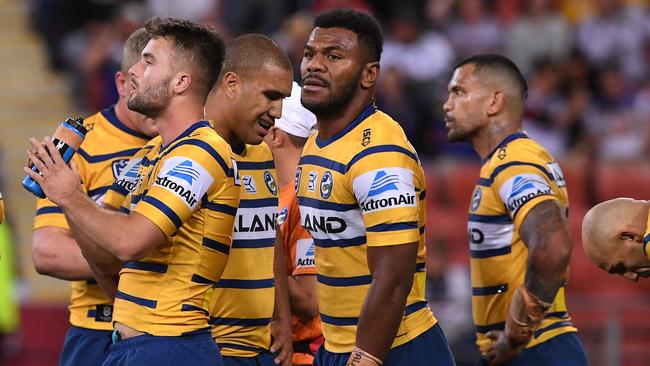 Parramatta players look on following another Storm try. Picture: AAP