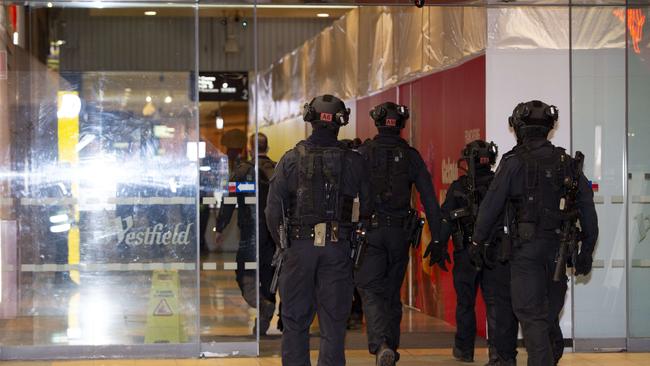 Armed police storm the Westfield Marion while it was in lockdown on June 23. Picture: Brett Hartwig