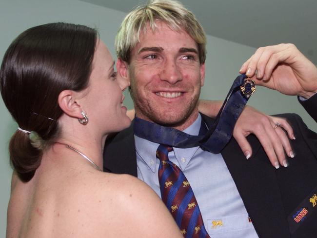 Jason Akermanis celebrates his Brownlow win with wife-to-be Megan.