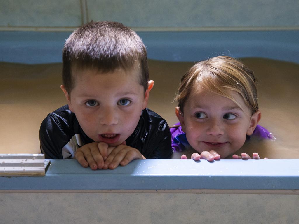 Talita Cohen, 4 and brother Casey, 2, pose for a portrait in a bath filled with tap water from the Darling River on January 17, 2019 in Louth, Australia. Local communities in the Darling River area are facing drought and clean water shortages as debate grows over the alleged mismanagement of the Murray-Darling Basin. Recent mass kills of hundreds of thousands of fish in the Darling river have raised serious questions about the way WaterNSW is managing the lakes system, and calls for a royal commission. (Photo by Jenny Evans/Getty Images)