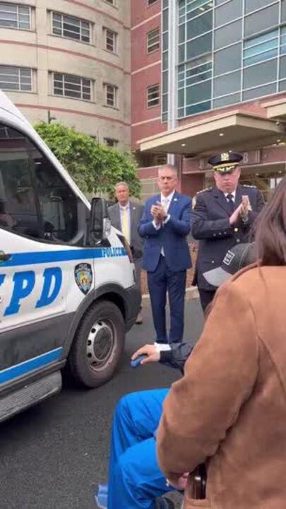 NYPD Cop Who Was Beaten and Robbed Cheered on Release From Hospital