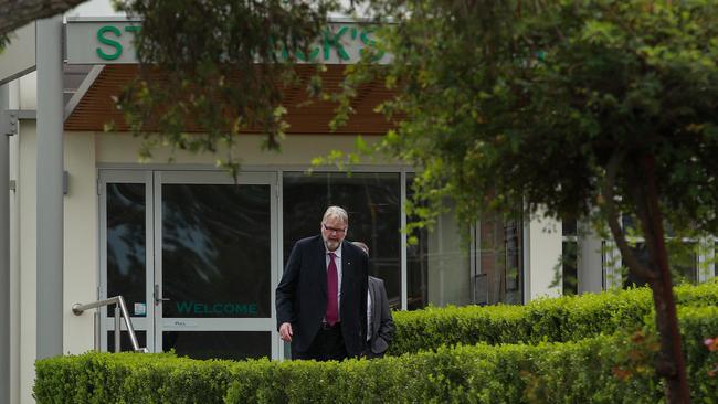 Catholic Diocese of Parramatta executive director Greg Whitby leaves St Patrick's Marist College, Dundas, on Monday. Picture:Justin Lloyd