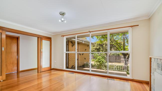 Natural light floods the living zone at 100 Apex Ave, Belmont.