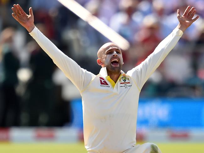 Australia's Nathan Lyon celebrates taking the wicket of England's Ben Stokes (unseen) for 13 runs on the second day of the second Ashes cricket Test match between England and Australia at Lord's Cricket Ground in London on August 15, 2019. (Photo by Glyn KIRK / AFP) / RESTRICTED TO EDITORIAL USE. NO ASSOCIATION WITH DIRECT COMPETITOR OF SPONSOR, PARTNER, OR SUPPLIER OF THE ECB