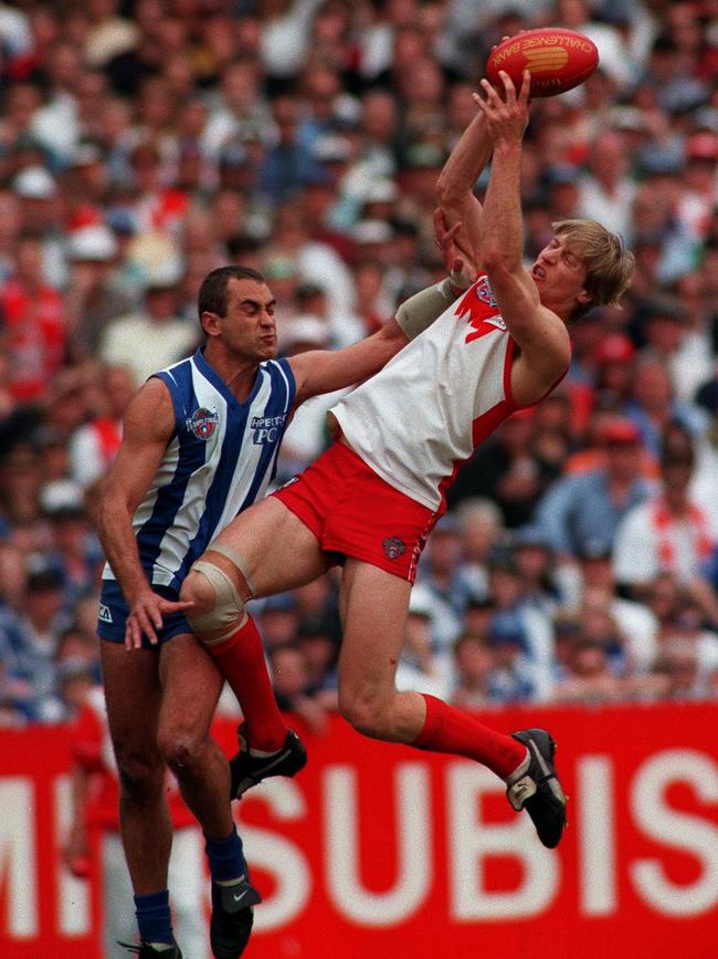 Troy Luff marks over Wayne Schwass in the 1996 grand final. Picture: Wayne Ludbey