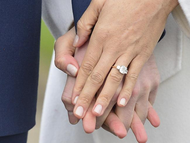 Prince Harry, 33, designed his fiancee’s engagement ring which includes two diamonds that belonged to his mother, the late Princess Diana. Picture: Dominic Lipinski/PA via AP