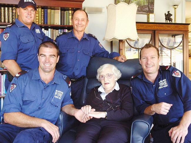 Pictured with his colleagues in 2007 after helping Shirley Robertson down her stairs. Picture: Sara Nixon