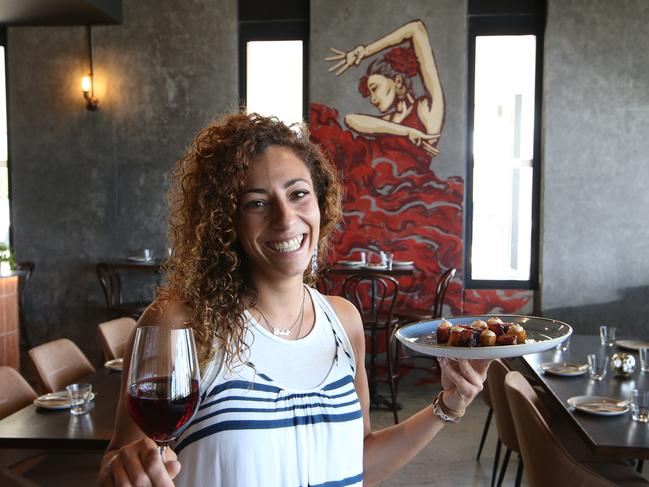 Manager Erika Buonadonna stands in the new neo-industrial style dining room. Picture Glenn Hampson