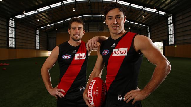 Michael Hibberd and Heath Hocking inside the Hanger at Tullamarine having both resigned into the future with Bombers. Pic: Michael Klein