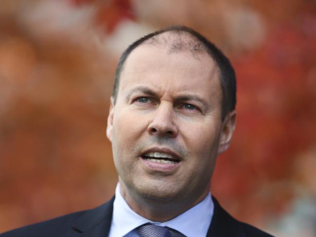 Australian Minister for the Environment and Energy Josh Frydenberg speaks to the media during a press conference at Parliament House in Canberra, Monday, May 21, 2018. AGL announced on Monday it had knocked back the purchase request from Alinta Energy to buy the Liddell power station for  $250 million because it wasn't in its best interests, despite government pressure. (AAP Image/Lukas Coch) NO ARCHIVING