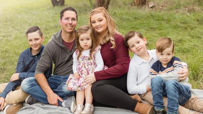 Julie and Chris Rigney pictured with their four children