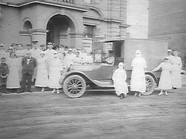 Ambulance &amp; staff outside Depot, Balmain Town Hall in 1919. Picture: State Library NSW