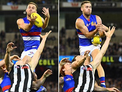 Hayden Crozier's spectacular mark against Collingwood. Pictures: Getty