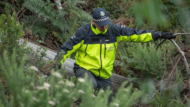 Police Search and Rescue officers on the Great Alpine Road in Mount Hotham. Picture: Jason Edwards