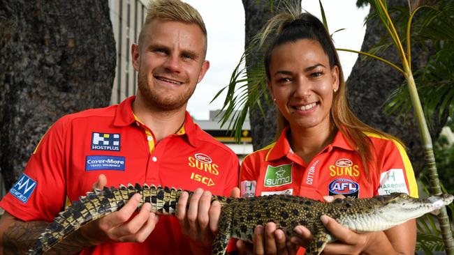 Gold Coast suns players Brandon Ellis and Taylor Thorn get a feel of the local wildlife. Picture: Che Chorley