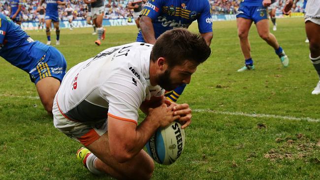 The Tigers fullback has scored eight tries in as many matches this season. Picture Brett Costello