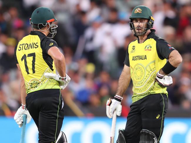 ADELAIDE, AUSTRALIA - NOVEMBER 04:  Marcus Stoinis of Australia and  Glenn Maxwell of Australia during the ICC Men's T20 World Cup match between Australia and Afghanistan at Adelaide Oval on November 04, 2022 in Adelaide, Australia. (Photo by Sarah Reed/Getty Images)