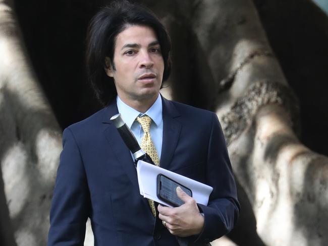 Daily Telegraph September 5/22. Fadi Ibrahim walks into the hospital rd Supreme Court with his lawer . Picture John Grainger