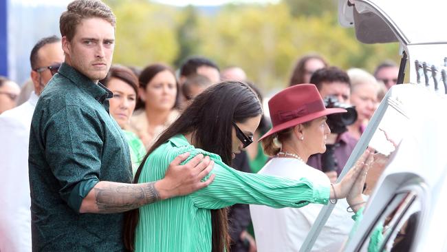 Hope Cowley in green farewells her sister Olyvia Cowley at her funeral - after she died in Bali two weeks ago. Picture: NCA NewsWire/ Richard Gosling