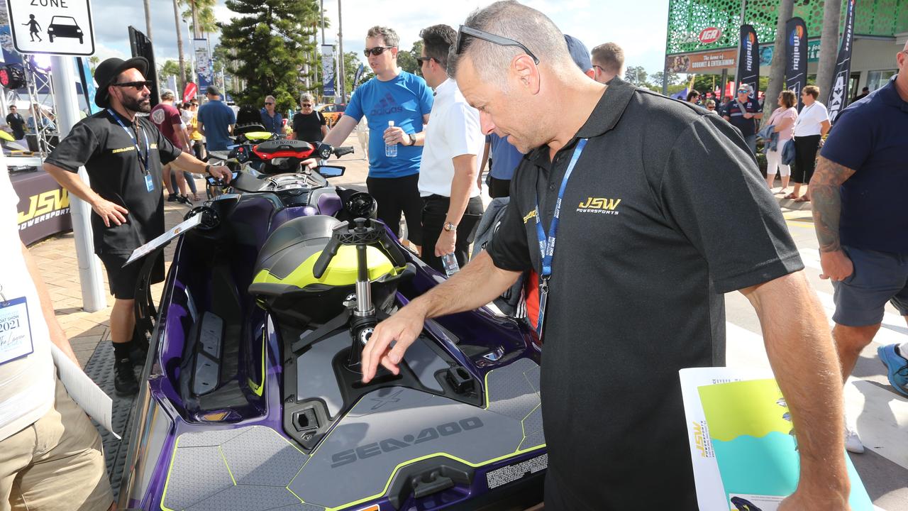 Checking out what is on offer at the Sanctuary Cove International Boat Show. Picture: Mike Batterham