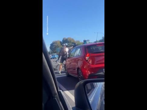 Bicyclist vs motorcyclist showdown in Adelaide