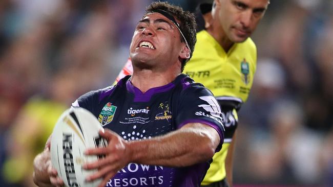 SYDNEY, AUSTRALIA — OCTOBER 01: Dale Finucane of the Storm scores a try during the 2017 NRL Grand Final match between the Melbourne Storm and the North Queensland Cowboys at ANZ Stadium on October 1, 2017 in Sydney, Australia. (Photo by Mark Kolbe/Getty Images)