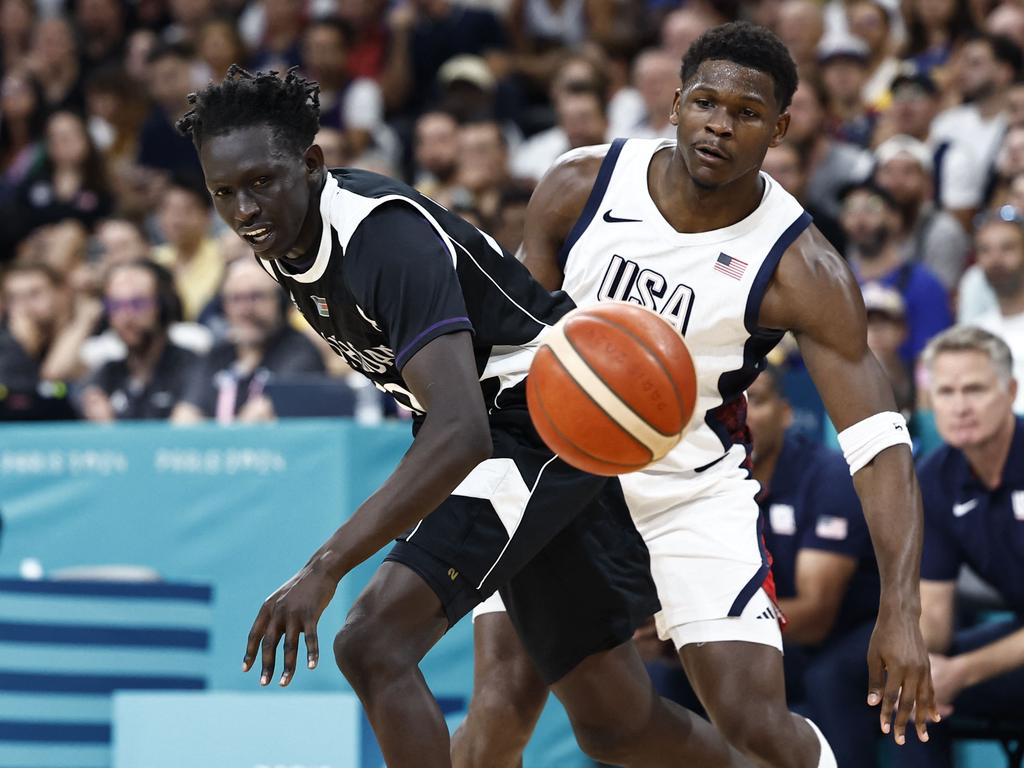 Jackson Makoi and Anthony Edwards eye the ball during the South Sudan-USA clash at the Paris Olympics. Picture: AFP